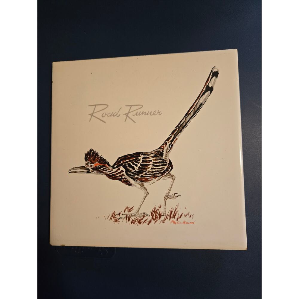 This item is a vintage ceramic art tile trivet featuring a roadrunner bird